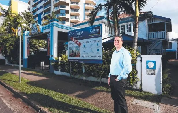  ?? Picture: STEWART McLEAN ?? LANDMARK: Jay Beattie of Colliers Internatio­nal on the Esplanade, where Floriana Guesthouse has sold for more than $1.5 million.