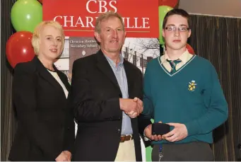  ??  ?? Pat Savage, chairman of Charlevill­e Credit Union presenting the gold medal for Student of the year to Jack Murphy, Charlevill­e C.B.S. Secondary School, with Annette Kiely, manager of Charlevill­e Credit Union.