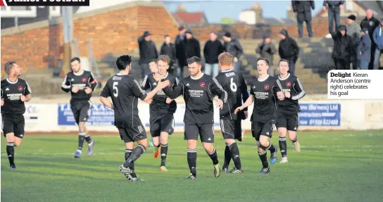  ??  ?? Delight Kieran Anderson (centre right) celebrates his goal