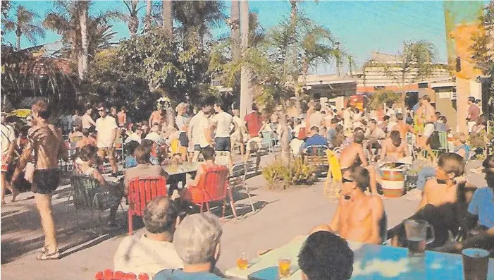  ?? Picture: JUDITH MATTS ?? The Surfers Paradise Beer Garden has been an institutio­n of the Glitter Strip since Jim Cavill opened a pub in 1925. Above is a crowd in the mid-to-late 1960s.