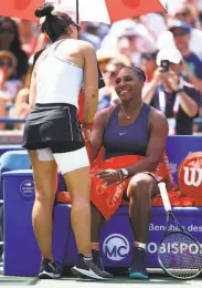  ?? Vaughn Ridley / Getty Images ?? Bianca Andreescu consoles Serena Williams after the American retired from their Rogers Cup final.