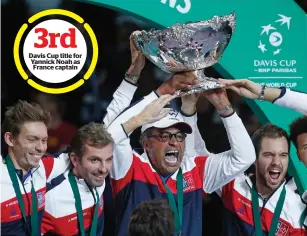  ?? AP ?? Davis Cup title for Yannick Noah as France captain French captain Yannick Noah (centre) holds the Cup with players after France won the Davis Cup title with a 3-2 win over Belgium in the final in Lille, France, on Sunday. —