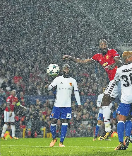  ??  ?? Giant leap forward: Marouane Fellaini scores Manchester United’s opener after replacing Paul Pogba last night