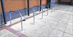  ??  ?? Here, there and everywhere: the ubiquitous exclamatio­n mark, former Fifa president Sepp Blatter and Ashford council leader Gerry Clarkson. And leisuresee­king cyclists seem few and far between, as these bike racks at the Eureka Leisure Park show