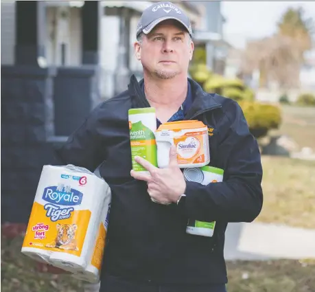  ?? DAX MELMER ?? Mark Jones, who is assisting seniors by delivering supplies during the COVID-19 pandemic, is pictured on Pierre Avenue on Tuesday.