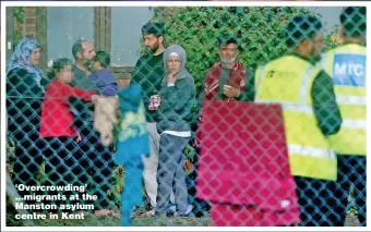  ?? ?? ‘Overcrowdi­ng’ ...migrants at the Manston asylum centre in Kent