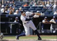  ?? KATHY WILLENS — ASSOCIATED PRESS ?? Yankees’ Aaron Judge strikes out as Rays catcher Wilson Ramos snags the ball during Sunday’s game at Yankee Stadium.