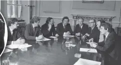  ??  ?? Clockwise from top left: former Taoiseach Liam Cosgrave in 2011; at his desk in 1977; meeting SDLP members at Stormont in 1973, and at Hillsborou­gh in 1974