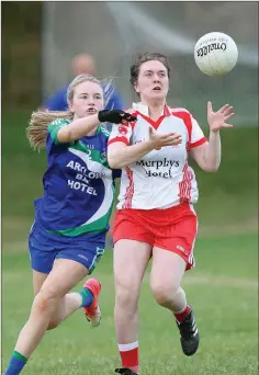  ??  ?? Niamh Kenny of Tinahely gets to the ball ahead of Eve Rogers of AGB.