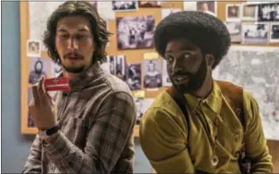  ?? DAVID LEE/FOCUS FEATURES VIA AP ?? This image released by Focus Features shows Adam Driver, left, and John David Washington in a scene from “BlacKkKlan­sman.”