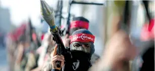  ??  ?? THE MARXIST-LENINIST Party of Germany, which has ties to the Popular Front for Liberation of Palestine (pictured), had its German bank accounts closed last week.