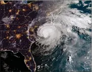  ??  ?? Hurricane Florence crashes into the Carolinas.