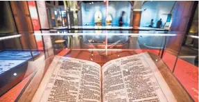  ??  ?? A King James Bible from 1617 on display in the D.C. museum. JIM LO SCALZO/EPA-EFE