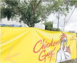  ?? AUSTIN FULLER ?? A banner outside 818 S. Orlando Ave. features the Chicken Guy! logo.