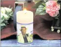  ?? PICTURE: BABALWA DHLAMINI ?? RENOWNED: A candle burns at the funeral of jazz singer Thandi Klaasen, held at the DJ Thomas Hall in Alberton yesterday.