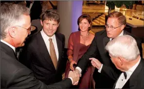  ??  ?? UAMS Chancellor Dan Rahn of Little Rock greets Gene Joyce, Kirsten and John O’Donnell, and Dr. F.E. Joyce, all of Texarkana.