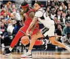  ?? Jessica Hill/Associated Press ?? St. John's Dylan Addae-Wusu, left, steals the ball from UConn's Jordan Hawkins on Jan. 15 in Hartford.