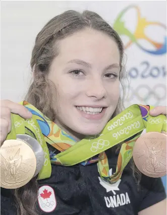  ?? THE CANADIAN PRESS/FILES ?? Finding talented young athletes like Penny Oleksiak, who won four Olympic medals in 2016 at the age of 16, requires a comprehens­ive strategy that weighs the importance of both nature and nurture.