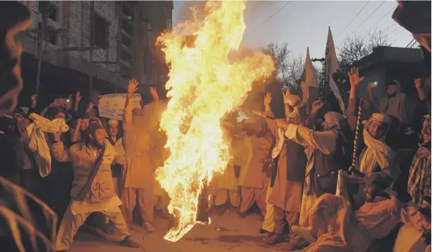  ?? PICTURE: BANARAS KHAN ?? US flag is burnt in Quetta after the United States said they were blocking a $255m aid package to Pakistan