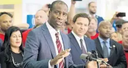  ?? CHRIS O’MEARA /AP ?? Florida Surgeon General Dr. Joseph Ladapo speaks to supporters and members of the media before a bill signing by Gov. Ron DeSantis on Nov. 18 in Brandon.