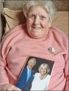  ?? ?? THRILLED: Irene Lloyd with the royal card marking her 100th birthday