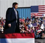  ?? DOUG MILLS / THE NEW YORK TIMES ?? President Donald Trump takes the stage Saturday for a campaign rally at Elko, Nev. The president said he will pull the United States out of a 31-year-old nuclear missile treaty with Russia.