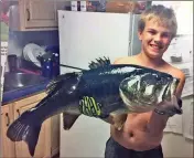  ?? LOANED PHOTO ?? 12-YEAR-OLD NOAH TAYLOR bass he caught recently. holds the 11-pound largemouth