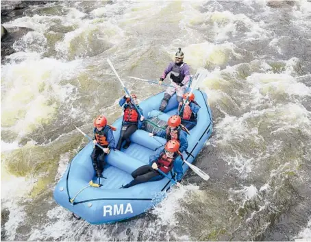  ?? THOMAS PEIPERT/AP ?? Dylan Dems, a rafting guide for Rocky Mountain Adventures, takes a group down a whitewater section of the Cache la Poudre River near Fort Collins, Colorado, last month. Across Colorado, lakes and rivers are at some of their lowest levels.