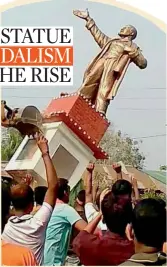  ?? Agencies ?? A statue of communist icon Lenin, being pulled down by some people with an excavator machine at Belonia in South Tripura district on March 6. The CPM held BJP workers responsibl­e for it.