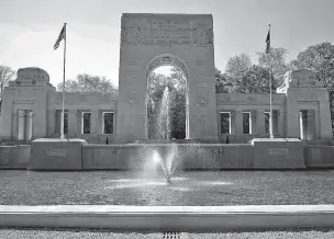  ??  ?? The front of the Lafayette Escadrille Memorial Cemetery near Paris features an enormous arch. The memorial cemetery is open to the public daily, and is located inside the gates of Domaine National de Sainte-Cloud.