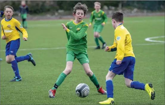  ??  ?? Kerry’s Daithi Tyrrell in action against Sami Laaksonen, South Tipperary, in the Munster Plate U-12 Final at Mounthawk Park on Sunday. Photo By Domnick Walsh