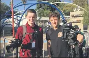  ?? PROVIDED BY ETHAN SWOPE ?? Ethan Swope, left, and Ian Duncanson stand outside the Benito Juarez sports complex while working on their documentar­y “Migrantes” in Tijuana, Mexico.