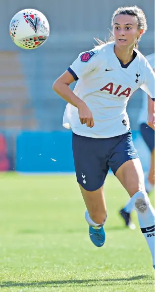  ??  ?? Giving chase: Spurs’ Rosella Ayane is tracked by Liverpool’s Melissa Lawley