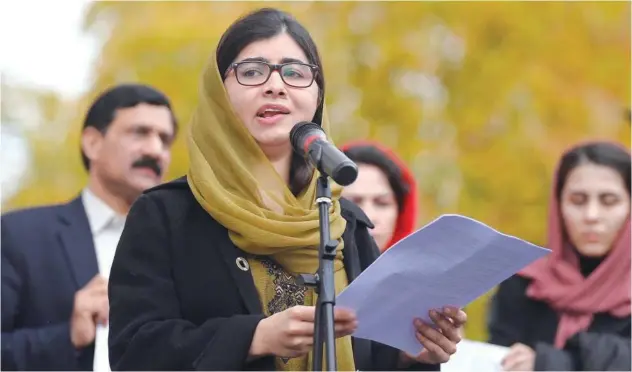  ?? Reuters ?? ↑
Pakistani activist and Nobel Peace Prize laureate Malala Yousafzai speaks at a rally in support of Afghan women’s rights in London on Sunday.