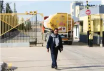  ?? – Reuters ?? RELIEF: A man stands as a fuel tanker arrives at Gaza’s power plant in the central Gaza Strip, on January 16, 2017.