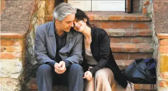  ?? IFC Films 2010 ?? William Shimell and Juliette Binoche star in “Certified Copy,” which was made outside Iran.