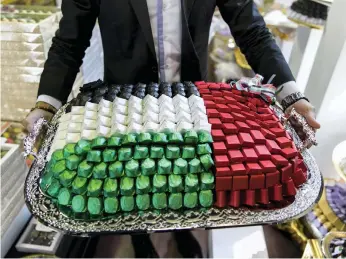  ?? Reem Mohammed / The National ?? Sweets in UAE colours at Chocolate Boutique in the capital