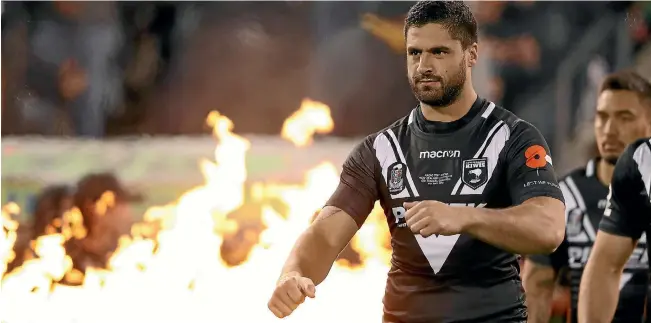  ?? MARK KOLBE/GETTY IMAGES ?? Jesse Bromwich of the Kiwis runs out on to the field before the Anzac test against Australia in Canberra in May. He was embroiled in a cocaine scandal with team-mate Kevin Proctor after the match.