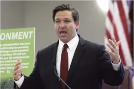  ?? STEVE CANNON AP file, 2019 ?? Federal judges hearing a challenge to a Florida constituti­onal amendment allowing felons to vote asked tough questions of the attorney for Gov. Ron DeSantis, above, repeatedly asking about the fairness of a subsequent bill.