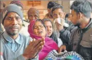  ?? PTI ?? Family members of the victims who fell critically ill after consuming spurious liquor wait outside a hospital in Saharanpur on Saturday.