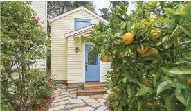  ??  ?? Tiny houses often complement larger family homes, serving as backyard quarters for in-laws or adult children. Below: John Weisbarth on the job.