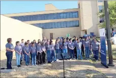  ?? Courtesy photos ?? Area citizens gathered at the flagpole and the Forsan Choir sang for the annual Stand Up event to raise awareness about Child Abuse Thursday.