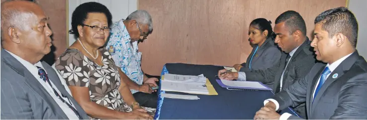  ?? Photo: Ronald Kumar ?? From left, SODELPA deputy general-secretary Anare Vuniwai, general-secretary Adi Litia Qionibarav­i with Anasa Vocea while submitting their nomination­s to the (from right), Supervisor of Election Mohammed Saneem, Fijian Elections Office legal officer Mesake Cawai and Romika Sewak on October 11, 2018.