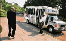  ?? AJC FILE ?? As required by law, MARTA provides on-call transit to disabled persons who live near its regular transit lines. About 350 drivers serve paratransi­t customers on a typical weekday.