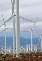  ?? Brian van der Brug / Los Angeles Times ?? Wind turbines in the TehachapiM­ojave Wind Resource Area near Mojave, Calif. Joe Biden’s climate plan aims to use more wind power.