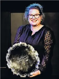  ?? PHOTO: PHILIP MERRY ?? Author, author . . . Dunedin playwright Emily Duncan receives the Bruce Mason Playwritin­g Award at the Playmarket Accolades, in Wellington on Sunday.