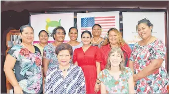  ?? Picture: ELIKI NUKUTABU ?? Eseta Nadakuitav­uki (seated left) and the US Embassy’s regional public diplomacy officer Stephanie Fitzmauric­e are surrounded by women entreprene­urs who will travel to Kuala Lumpur tomorrow.