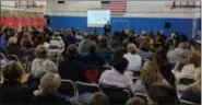  ?? PHOTO PROVIDED ?? Superinten­dent Jeff Simons addresses parents, staff and community members in the Bell Top gymnasium regarding the proposed boundary changes.