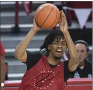  ?? (NWA Democrat-Gazette/Charlie Kaijo) ?? Arkansas guard Jalen Tate looks to make a pass during the Razorbacks’ Red-White game Nov. 11. Tate, Vance Jackson and Justin Smith are graduate transfers on the Arkansas roster.