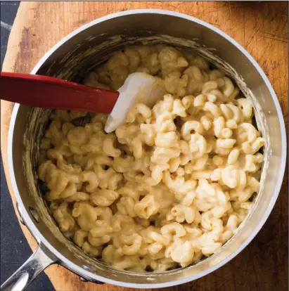  ??  ?? Macaroni and Cheese, from the cookbook “Revolution­ary Recipes.” Carl Tremblay/America’s Test Kitchen via AP